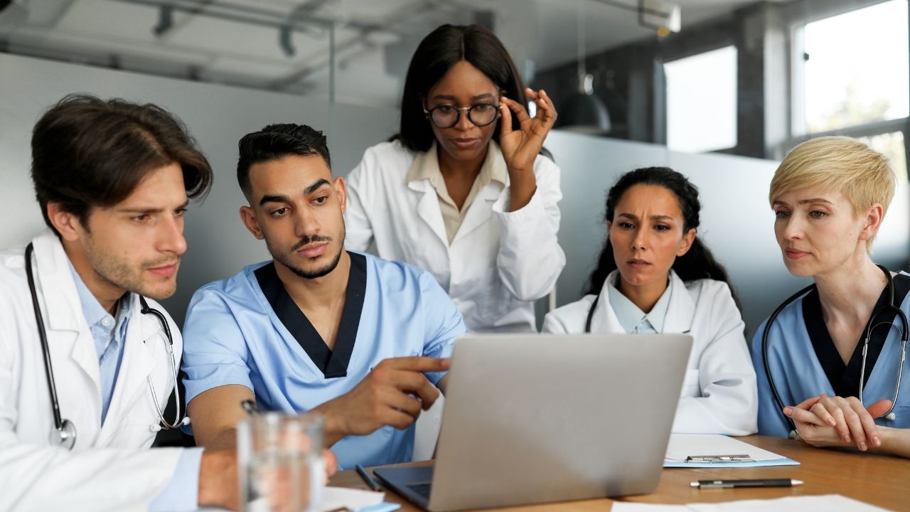 Healthcare team reviewing tail policy details