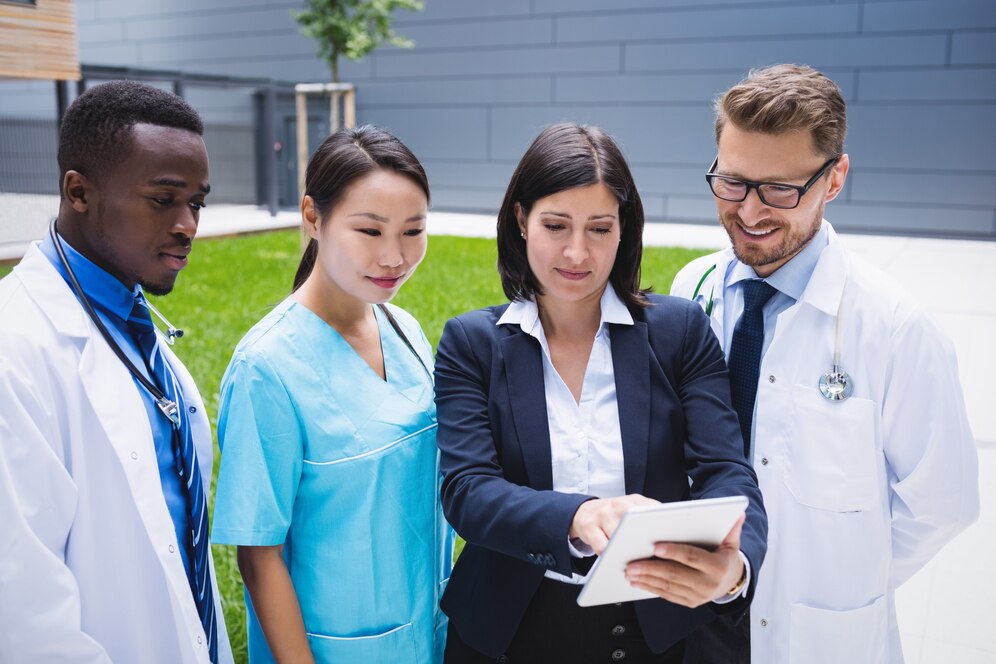 women insurance agent explaining professional-liability-insurnace to health care professionals