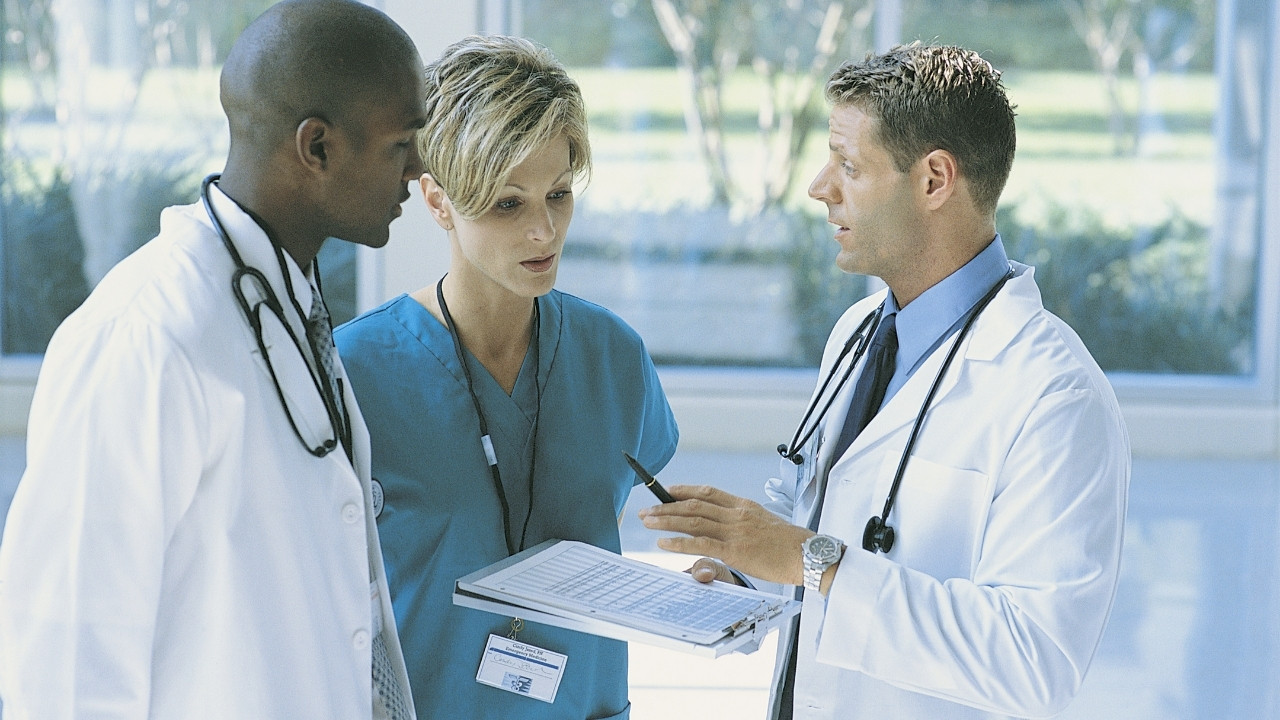  Physicians discussing the importance of long-term care insurance planning