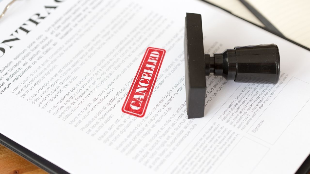 Cancelled medical malpractice insurance document with red stamp