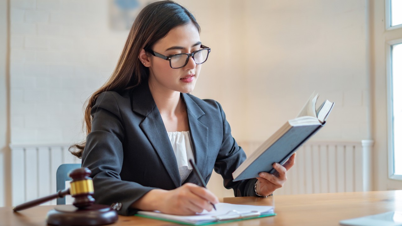 Lawyer reviewing Hammer Clause terms
