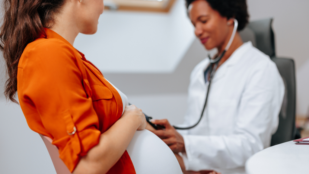 Pregnant lady taking consultant from OBGYNs doctor