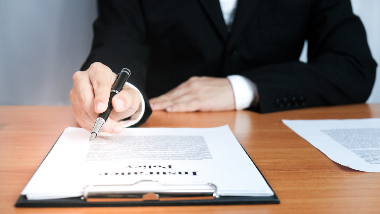 Insurance Agent showing what will be covered in malpractice insurance to Anesthesiologists