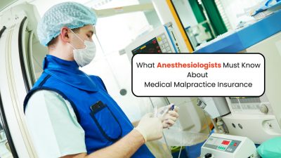 Anesthesiologist with equipment in OR