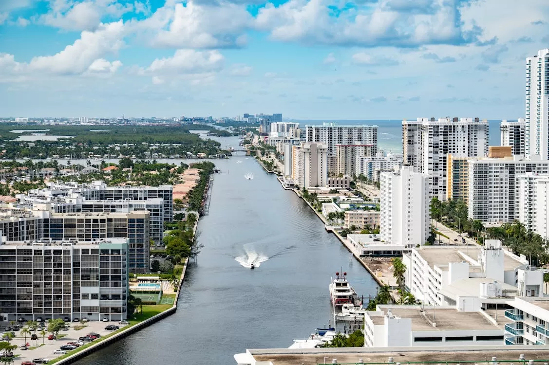 aerial view of a florida city, with skyscrapers along the riverwalk