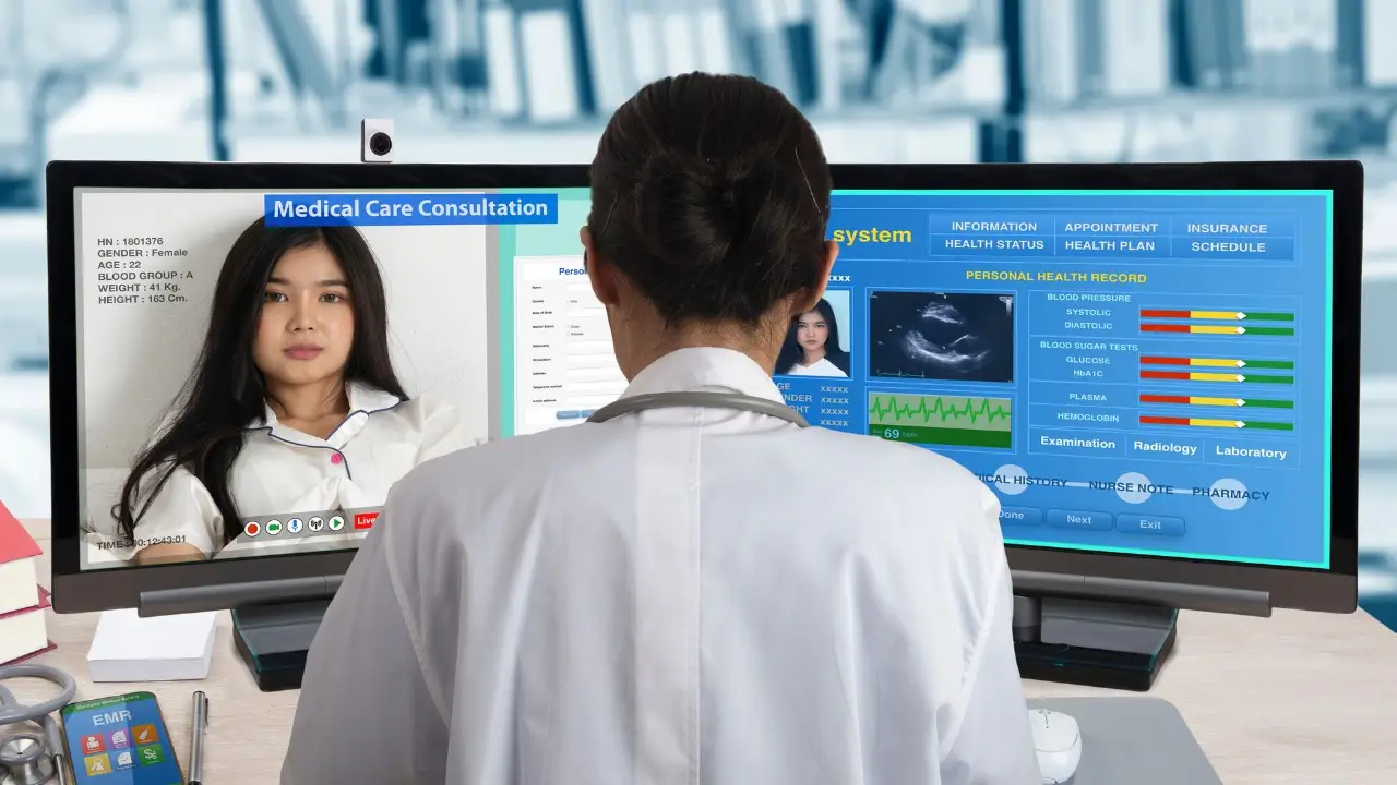 Doctor accessing patient data online during a telehealth consultation