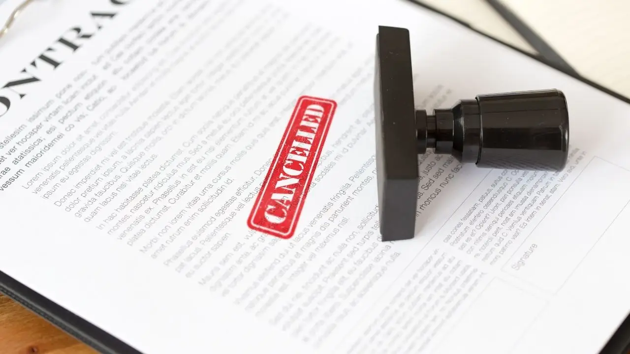 Cancelled medical malpractice insurance document with red stamp